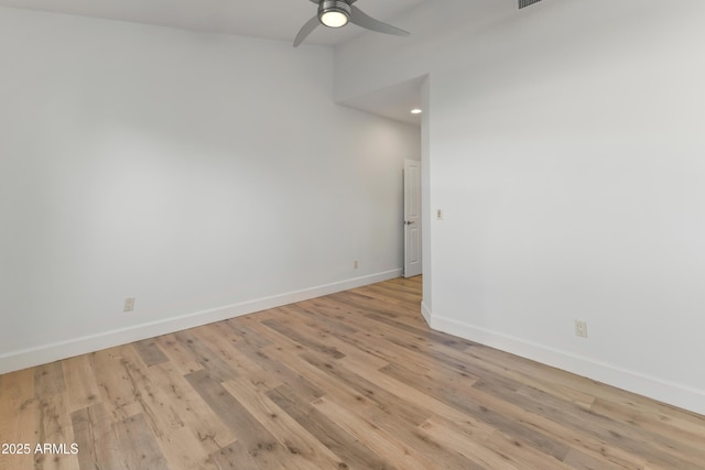 unfurnished room featuring light wood finished floors, baseboards, a ceiling fan, and recessed lighting