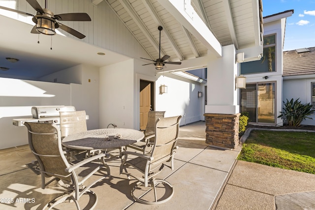 view of patio / terrace with outdoor dining area and a ceiling fan