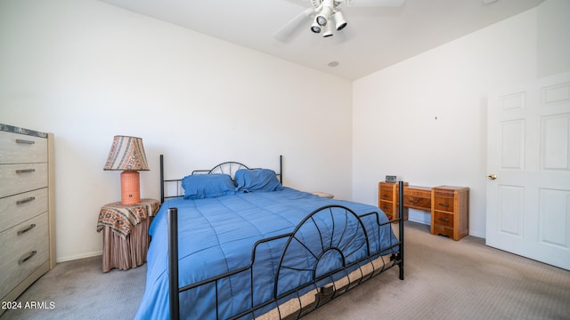 bedroom featuring light carpet and ceiling fan