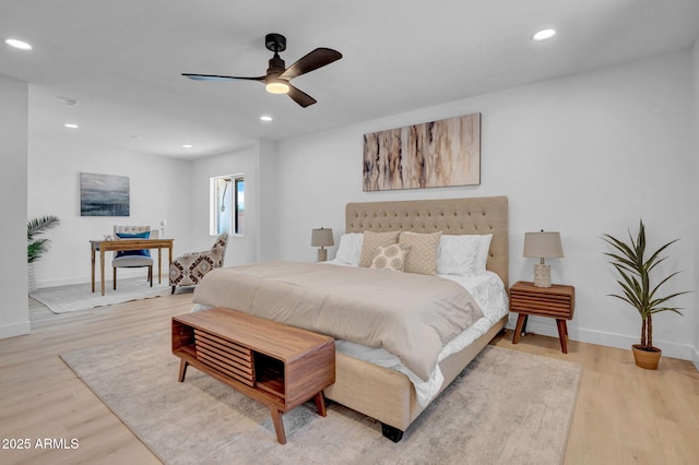 2712 N 20th Dr, Phoenix, AZ 85009 - bedroom with light wood-type flooring, recessed lighting, and a ceiling fan