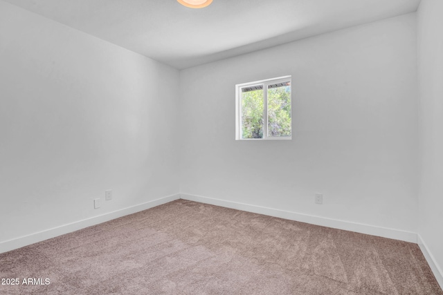 2712 N 20th Dr, Phoenix, AZ 85009 - carpeted spare room with baseboards