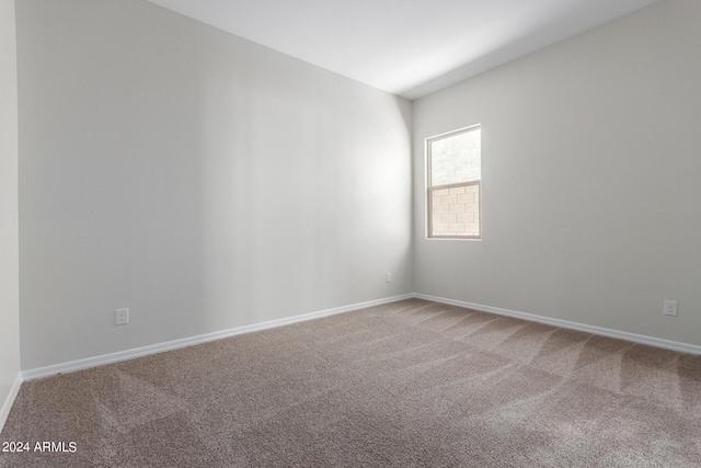 empty room with carpet floors