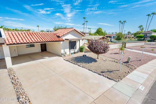 view of front of house with a carport