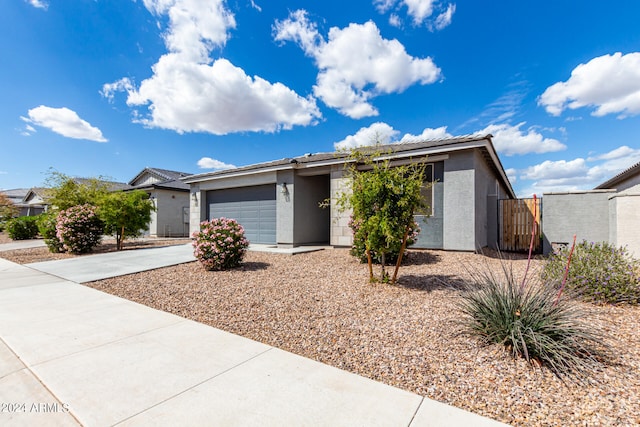 ranch-style home with a garage