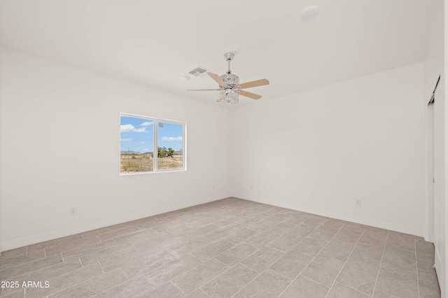 38167 W San Juan Ave, Tonopah, AZ 85354 - spare room featuring a ceiling fan and baseboards