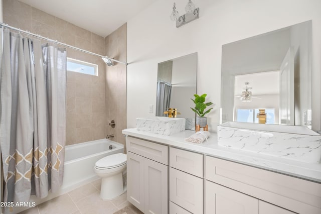 38167 W San Juan Ave, Tonopah, AZ 85354 - bathroom featuring shower / bath combo, toilet, vanity, tile patterned floors, and a ceiling fan