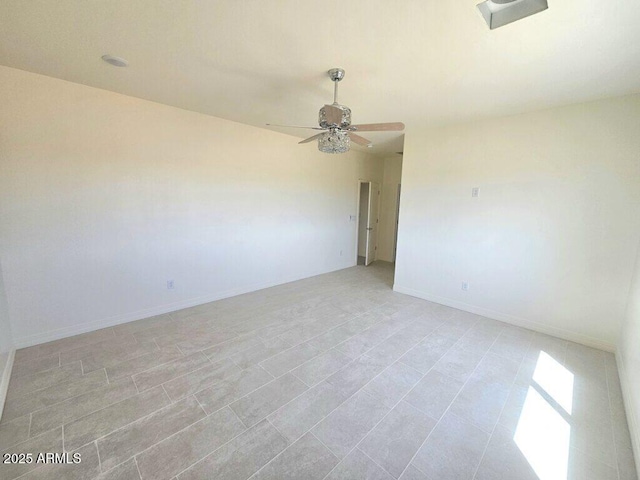 38167 W San Juan Ave, Tonopah, AZ 85354 - unfurnished room with a ceiling fan, baseboards, and light tile patterned floors