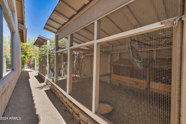 view of home's exterior with an outdoor structure