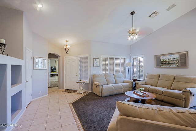 5049 E Duane Ln, Cave Creek, AZ 85331 - living area with visible vents, arched walkways, light tile patterned floors, and high vaulted ceiling