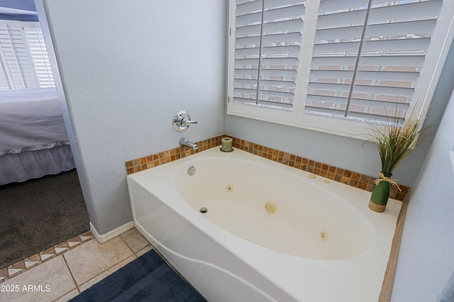 5049 E Duane Ln, Cave Creek, AZ 85331 - full bath featuring a tub with jets, plenty of natural light, and tile patterned flooring