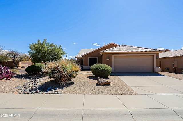 5049 E Duane Ln, Cave Creek, AZ 85331 - ranch-style house with an attached garage, driveway, a tile roof, and stucco siding