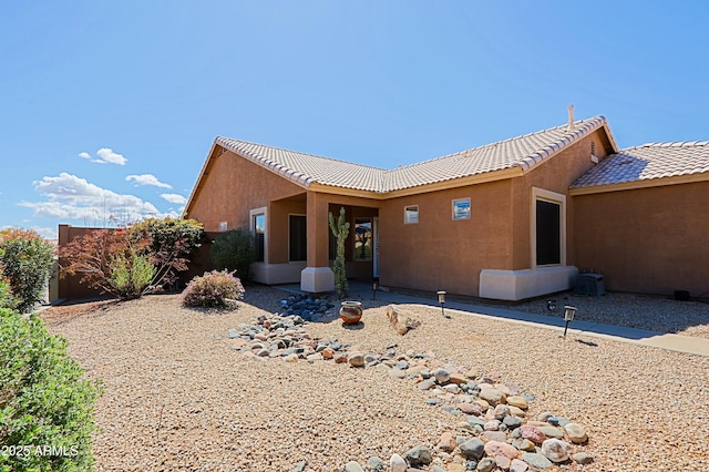 5049 E Duane Ln, Cave Creek, AZ 85331 - rear view of property with stucco siding and a tiled roof