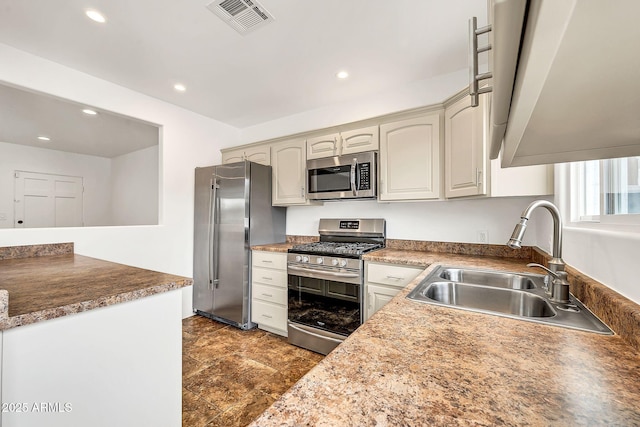 508 S Pasadena, Mesa, AZ 85210 - kitchen with appliances with stainless steel finishes, a sink, and recessed lighting