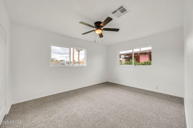 508 S Pasadena, Mesa, AZ 85210 - empty room with plenty of natural light, carpet floors, and ceiling fan