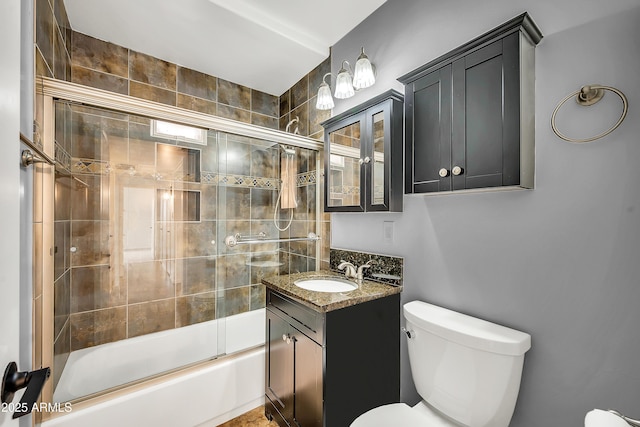508 S Pasadena, Mesa, AZ 85210 - full bathroom featuring toilet, vanity, and shower / bath combination with glass door