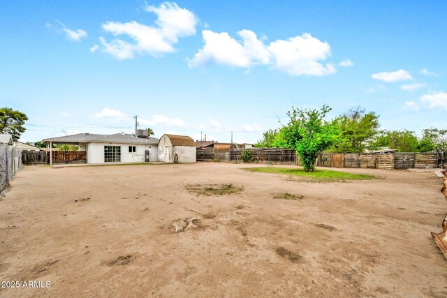 508 S Pasadena, Mesa, AZ 85210 - view of yard featuring an outdoor structure, a shed, and fence