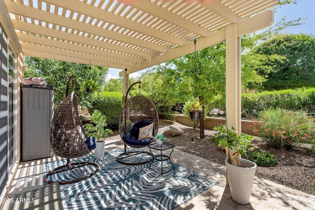 view of patio featuring a pergola