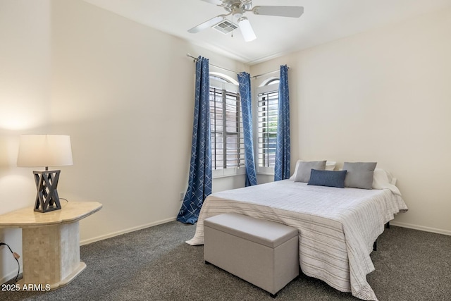 carpeted bedroom featuring visible vents, baseboards, and ceiling fan