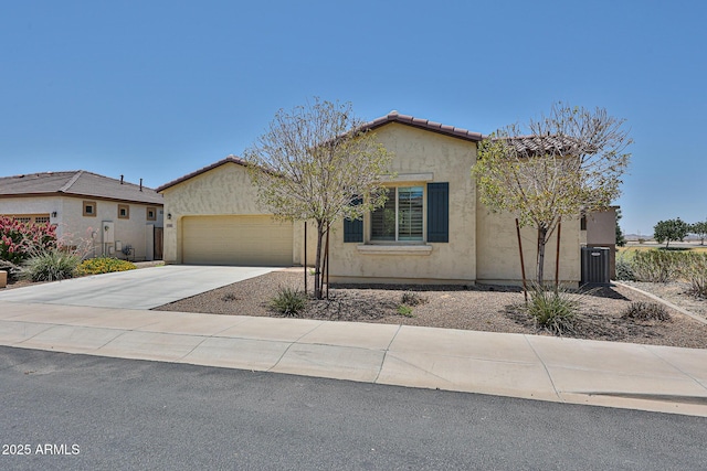 17082 S 182nd Ave, Goodyear, AZ 85338 - view of front of property with stucco siding, driveway, an attached garage, and a tile roof