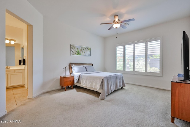 17082 S 182nd Ave, Goodyear, AZ 85338 - carpeted bedroom featuring ensuite bath and ceiling fan