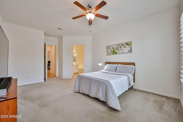 17082 S 182nd Ave, Goodyear, AZ 85338 - bedroom with light carpet, ensuite bath, and a ceiling fan
