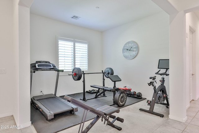 17082 S 182nd Ave, Goodyear, AZ 85338 - workout room with arched walkways and light tile patterned floors