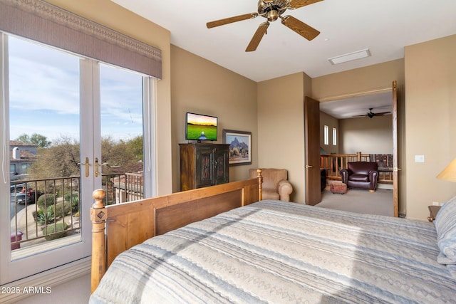 carpeted bedroom featuring french doors, ceiling fan, and access to outside