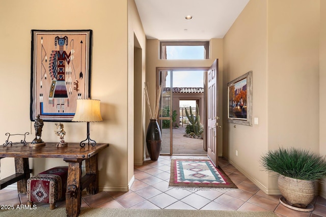 foyer with light tile patterned floors