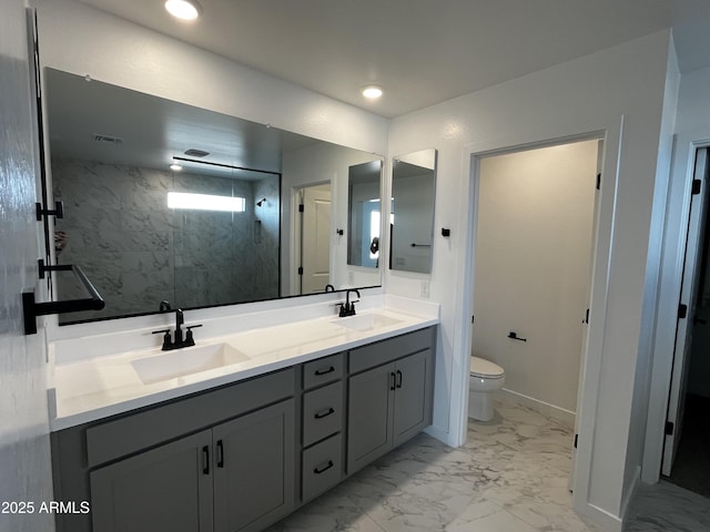 17481 W Fulton St, Goodyear, AZ 85338 - bathroom featuring double vanity, a marble finish shower, toilet, marble look tiles, and recessed lighting