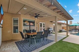 view of patio with ceiling fan