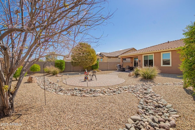 view of yard with a patio area and a fenced backyard