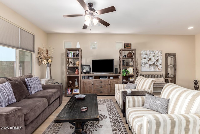 living room featuring ceiling fan