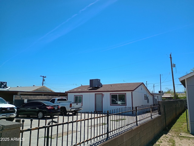 view of front of property with central AC