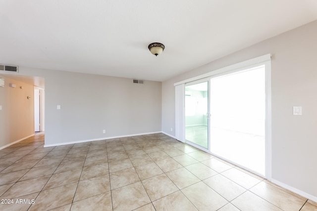 view of tiled empty room