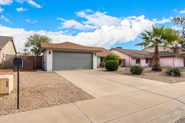 ranch-style home with a garage