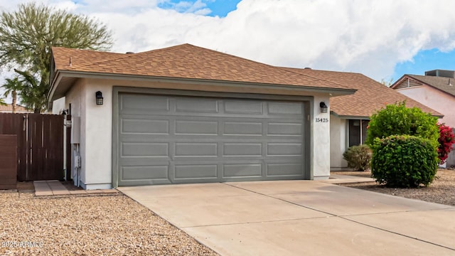 ranch-style house featuring a garage