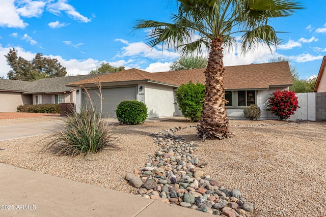 ranch-style home with a garage