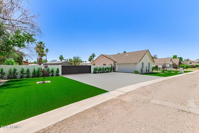 1513 S 108th Way, Chandler, AZ 85286 - view of front of house featuring driveway, an attached garage, and stucco siding