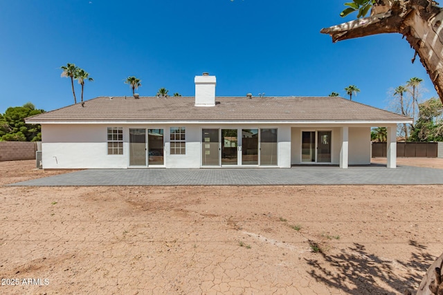 1513 S 108th Way, Chandler, AZ 85286 - rear view of house featuring a patio area, a chimney, and stucco siding