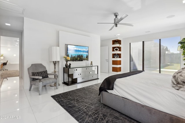 tiled bedroom featuring ceiling fan and access to outside