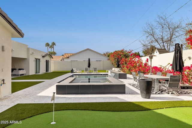 view of swimming pool featuring a patio