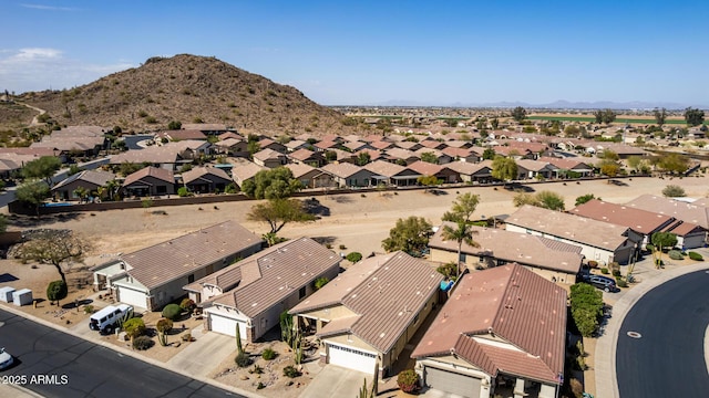 drone / aerial view featuring a mountain view and a residential view