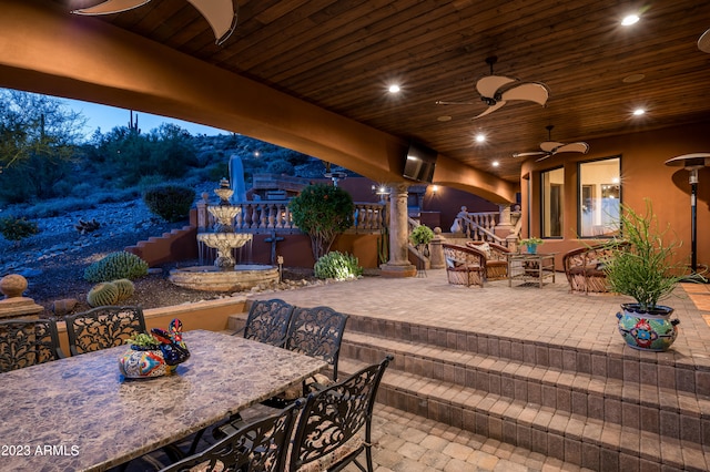 view of patio / terrace featuring ceiling fan