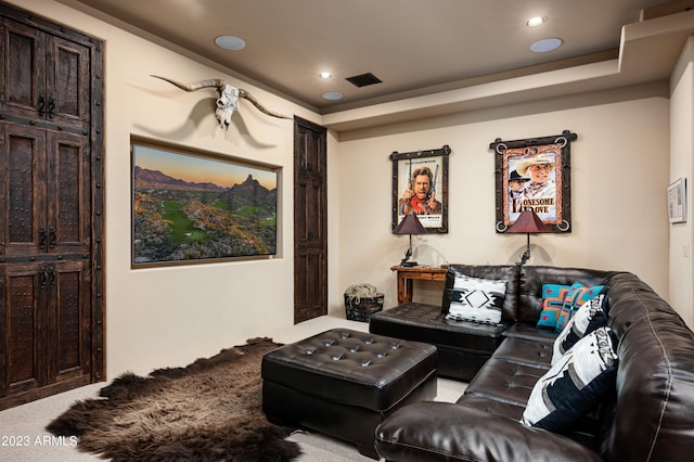 living room featuring light carpet