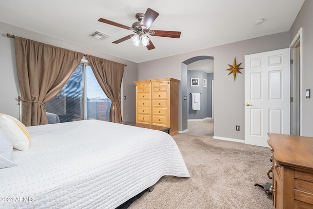 carpeted bedroom featuring ceiling fan and access to exterior