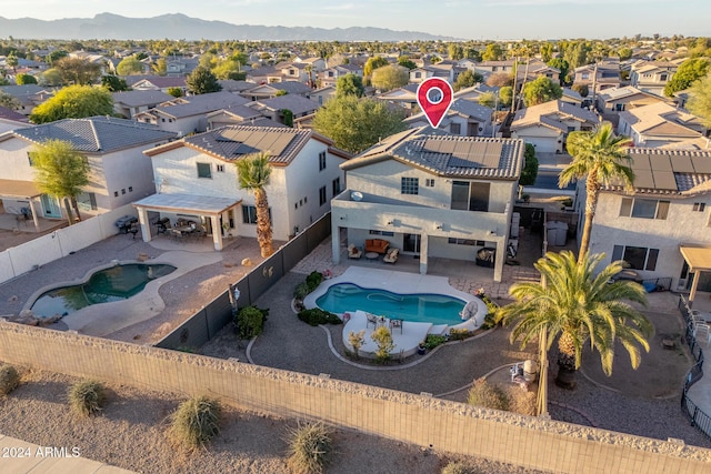 drone / aerial view featuring a mountain view