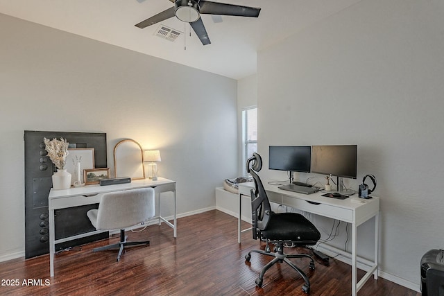 office space featuring a ceiling fan, wood finished floors, visible vents, and baseboards