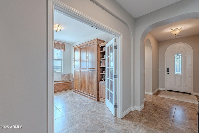 view of tiled foyer entrance