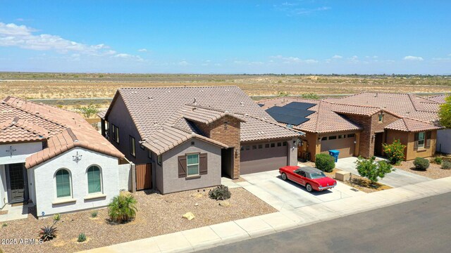 19560 W Valle Vista Way, Litchfield Park, AZ 85340 - single story home featuring an attached garage, a tile roof, driveway, and stucco siding