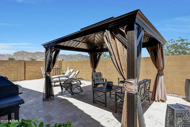 19560 W Valle Vista Way, Litchfield Park, AZ 85340 - view of patio featuring a fenced backyard, a gazebo, and a mountain view